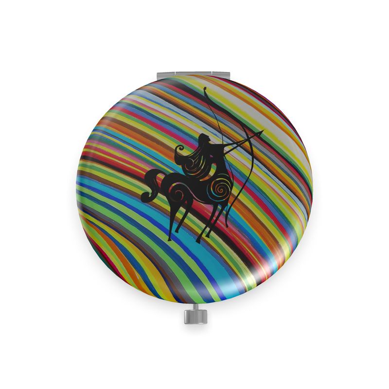 Designer-Taschenspiegel Sternzeichen Schütze mit Zentaur als schwarzer Scherenschnitt vor Sonne mit bunten Lichtstreifen, runde Form aus hochwertigem Metall mit matter Oberfläche